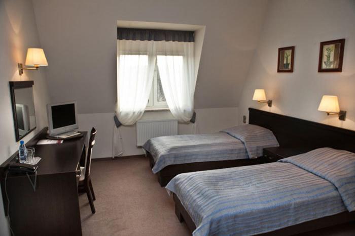 Portius Hotel Krosno Cameră foto