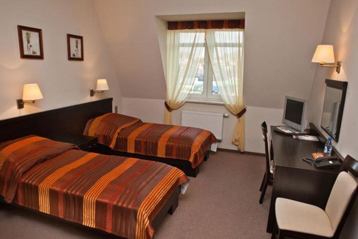 Portius Hotel Krosno Cameră foto